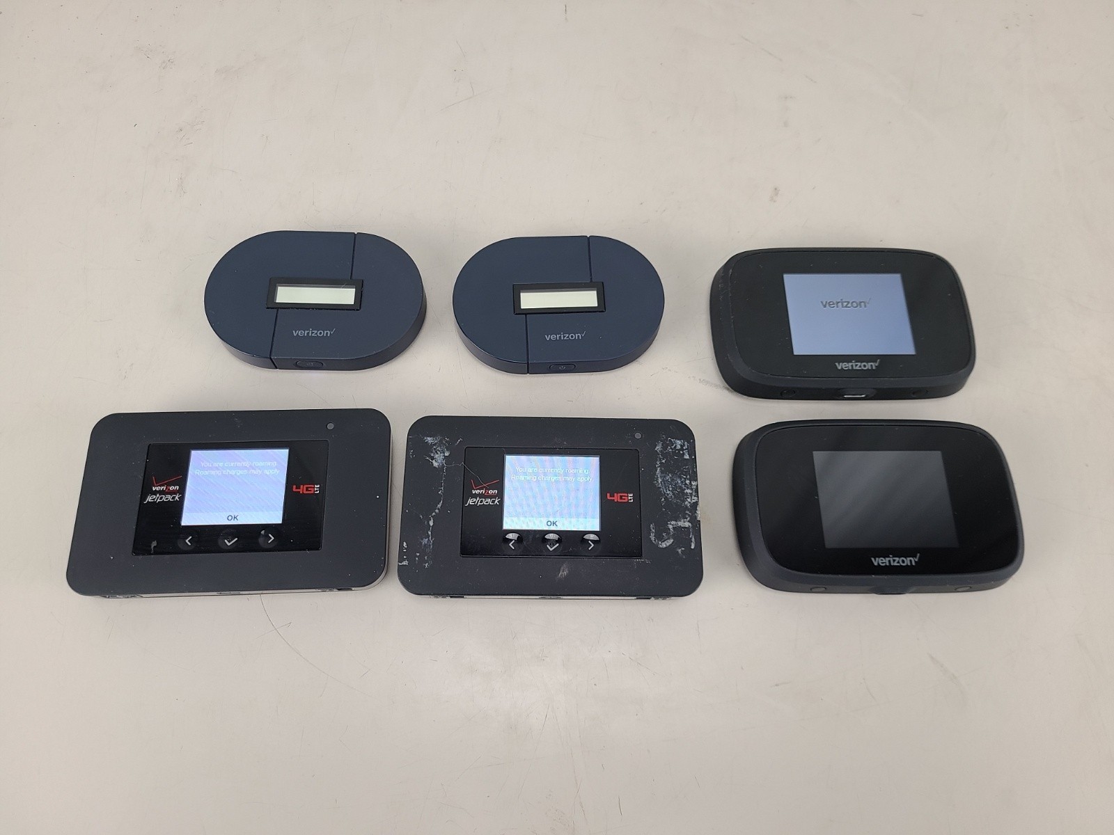 Verizon hot spot lot of 6 Elipsis, MiFi, Netgear Routers Hubs
