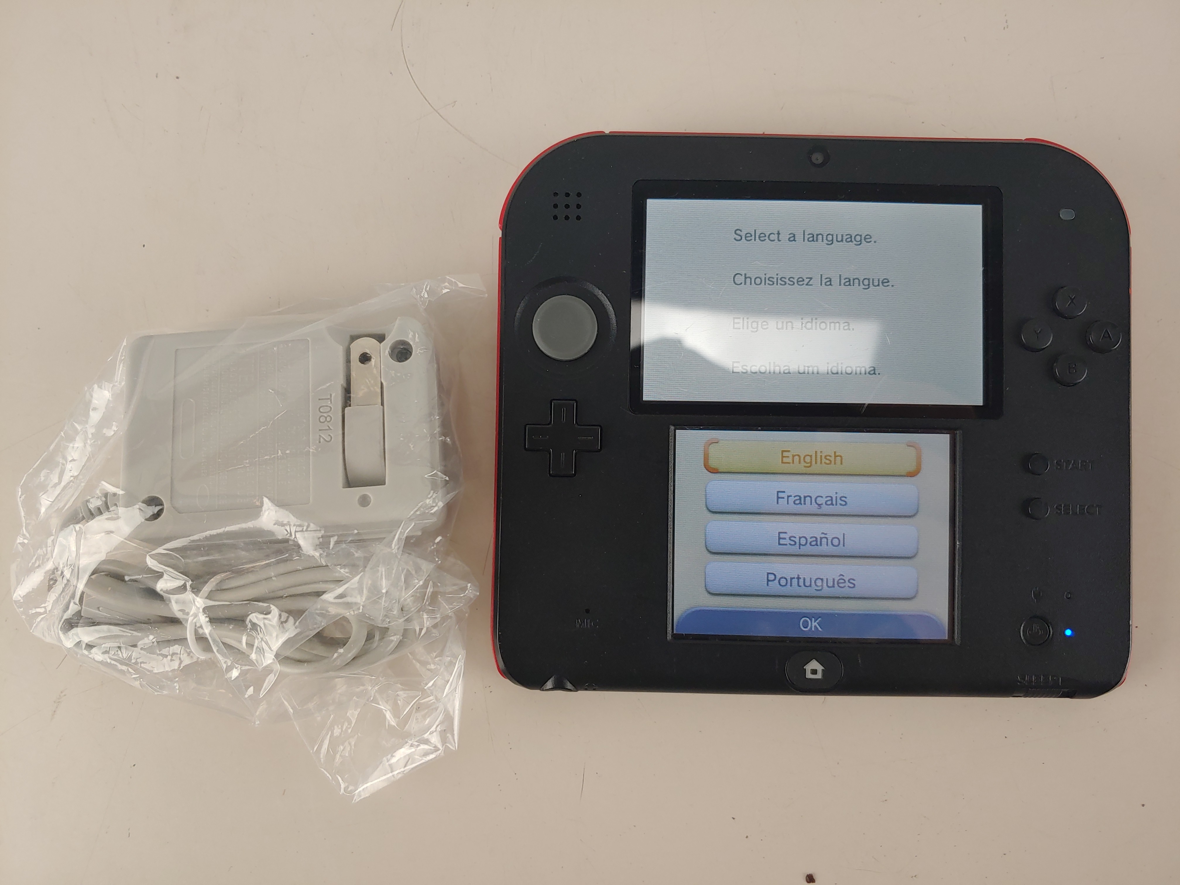 Used Nintendo 2DS Handheld Console and AC Adapter
