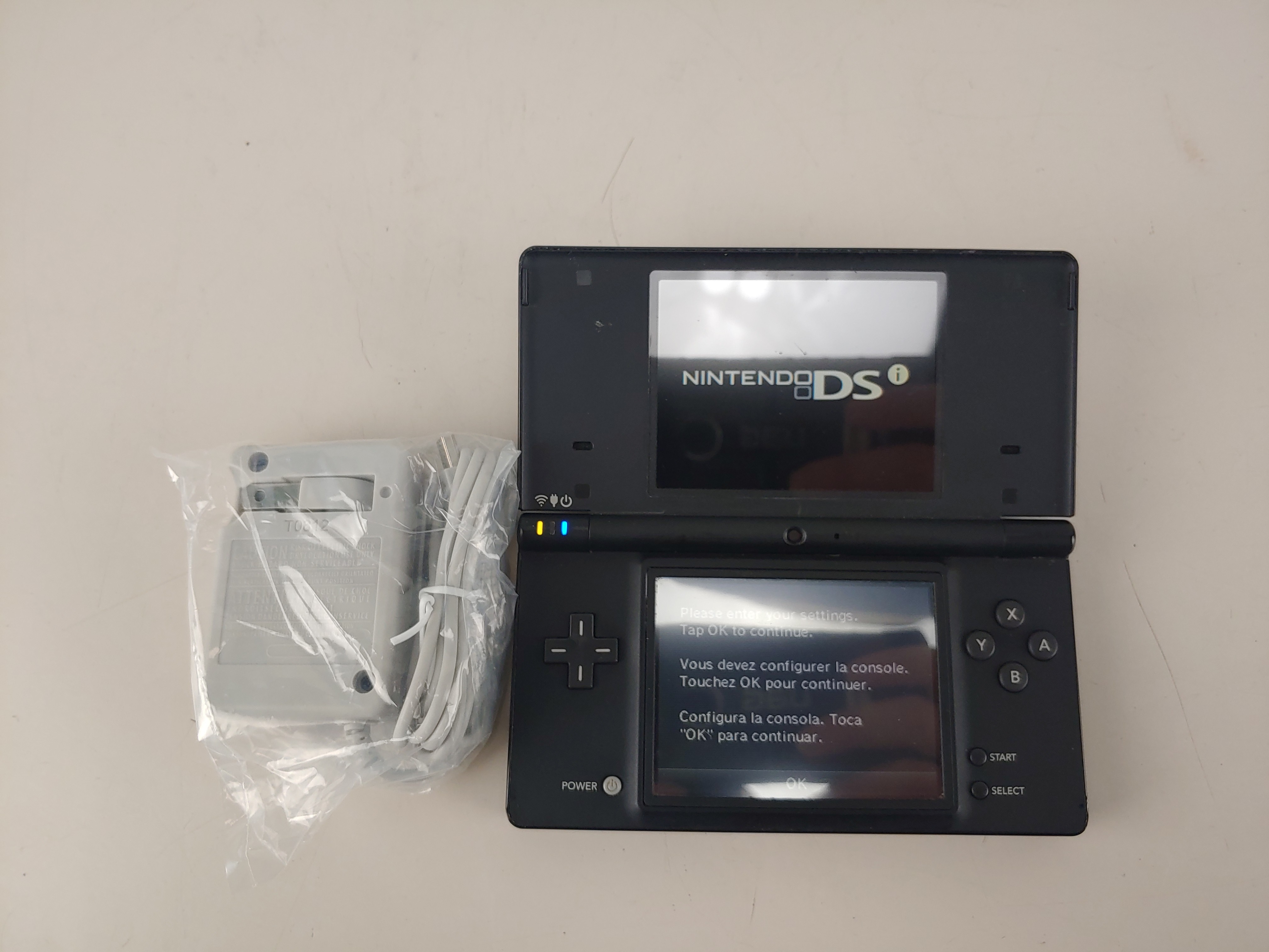 Used Nintendo DSi Handheld Console and AC Adapter