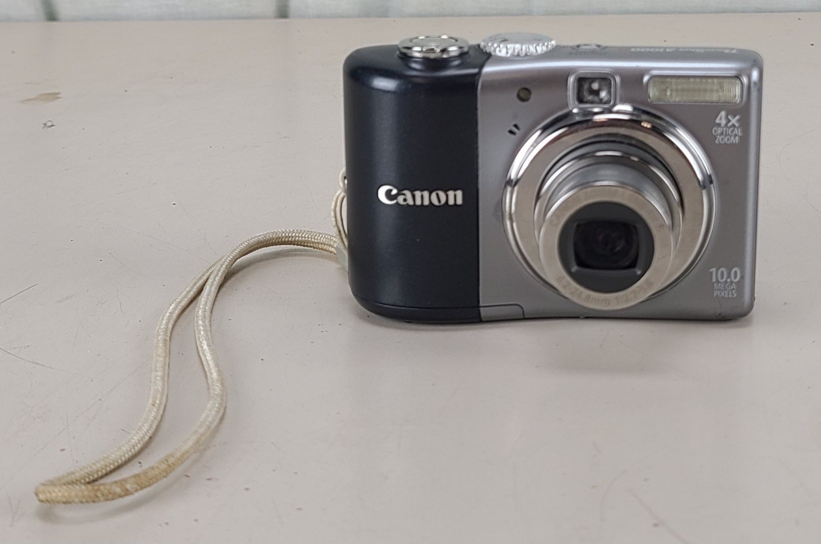 Canon PowerShot A1000 IS 10MP 4X Optical Zoom Camera w/4GB SD Card
